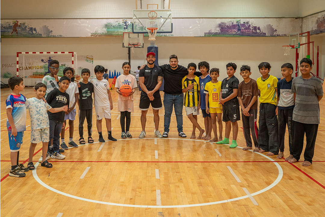 Group photo of participants during a Primal Fitness training session